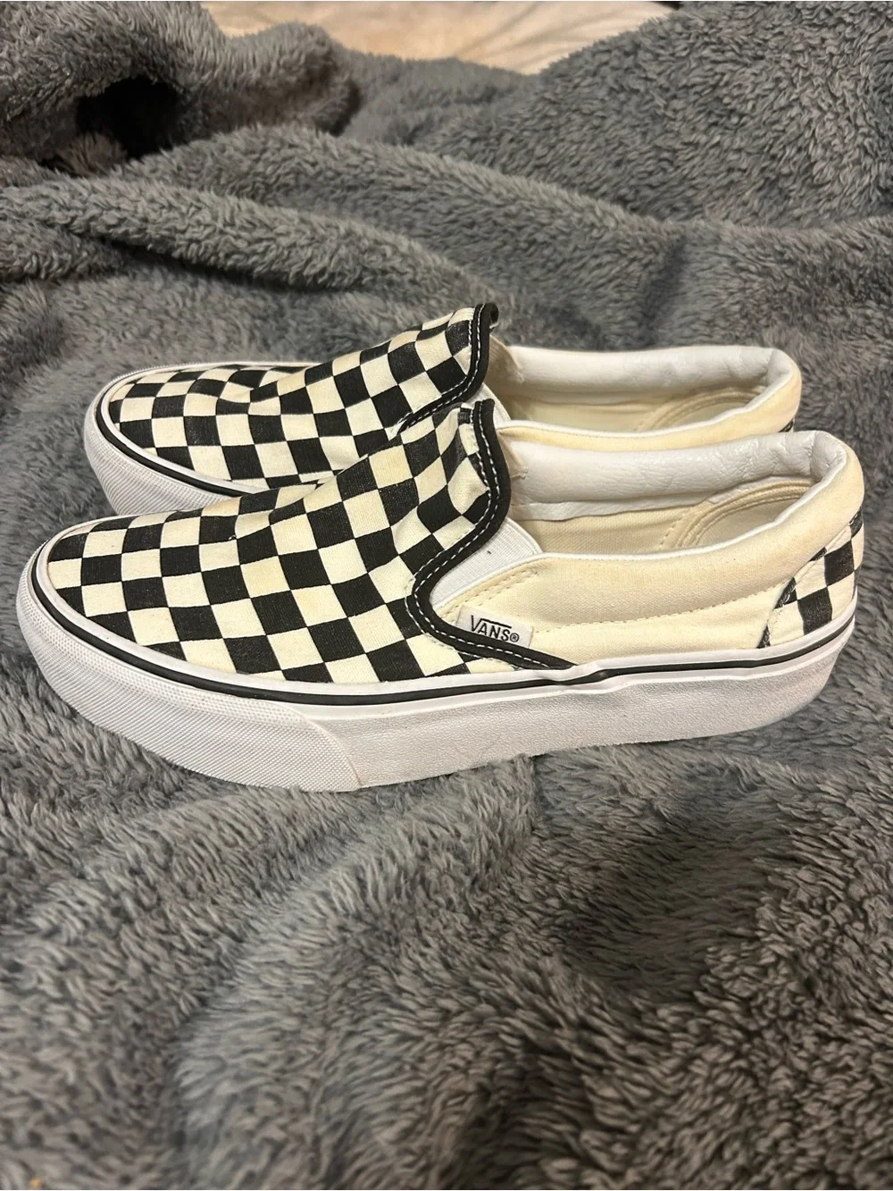 Vans Checkerboard Slip-On Sneakers in Black and White